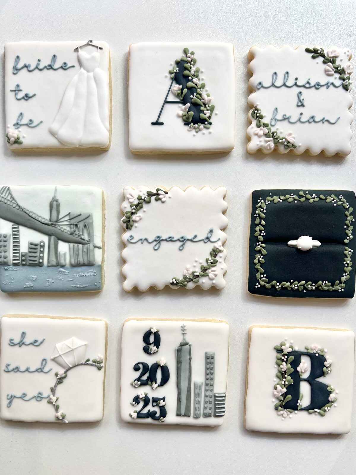 Nine-piece wedding cookie set for Allison and Brian, including a bridal gown, monogram, engagement ring, and New York City skyline